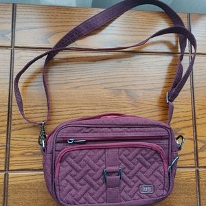 Lug " carousel" cross body bag, 10 x 7 inches, maroon